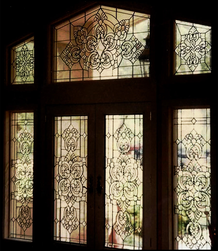 Beveled and etched leaded glass entry door and transom windows, by Monica Huber