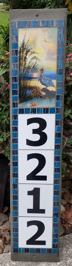 Beach Image of Pelican and Turtle with Tidepool borders vertically mounted. Measures 7.25" wide. Length as shown with 4 numbers is 36" high